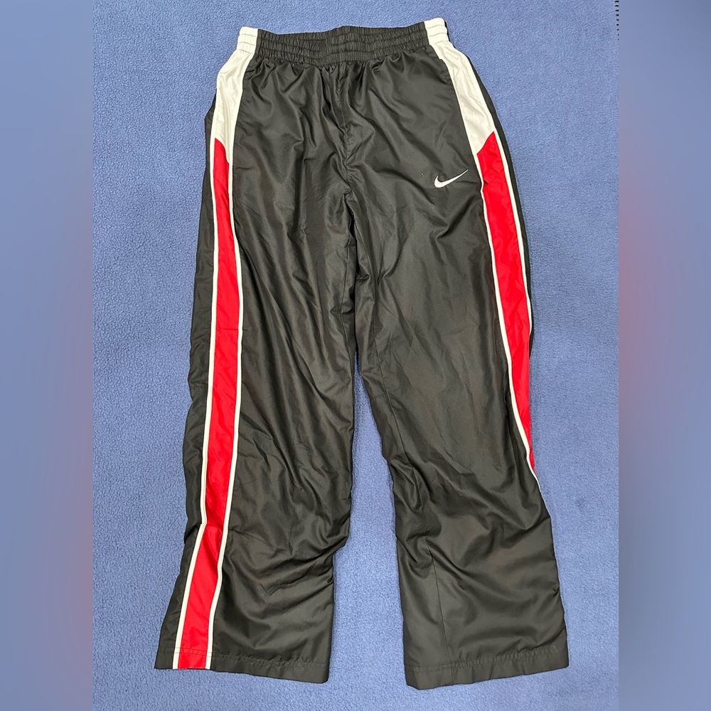 Nike Boys sweats size large, polyester, side pockets, open leg (non-elastic)
